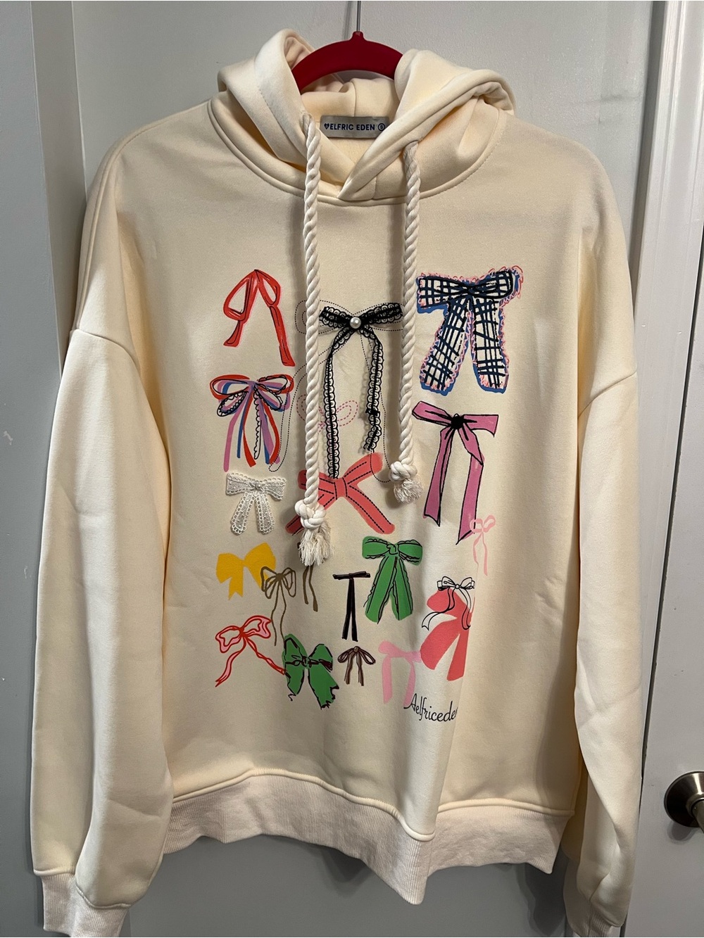 Aelfric Eden oversized Cream Hooded Sweatshirt with Colorful Bow Motif; small